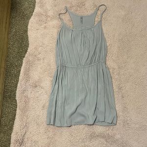 The color is a green type blue color and it is a flurry shirt